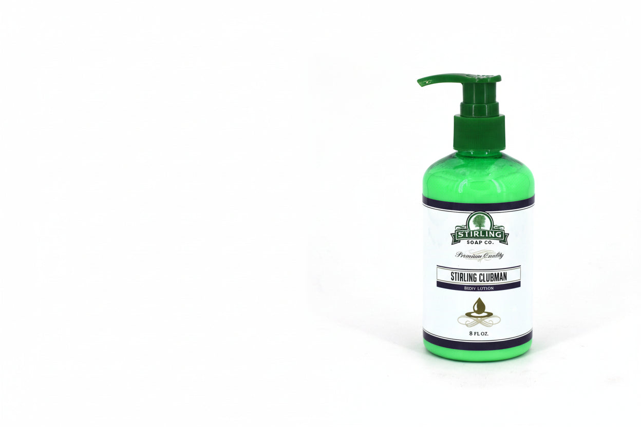 Green bottle of Stirling Clubman body lotion on a white background